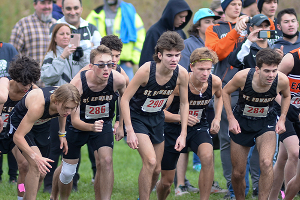 st edward cross country team readying before the start of a race