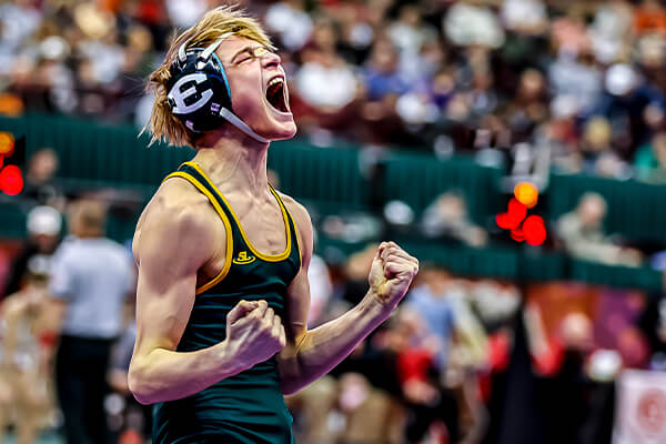 st. edward high school wrestler after winning a match