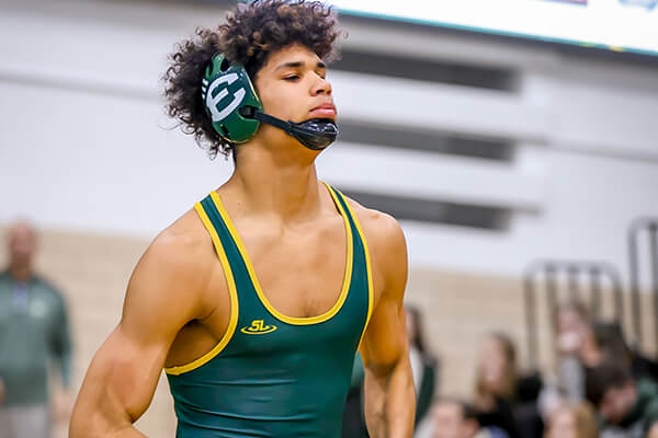 st. edward high school varsity green wrestler