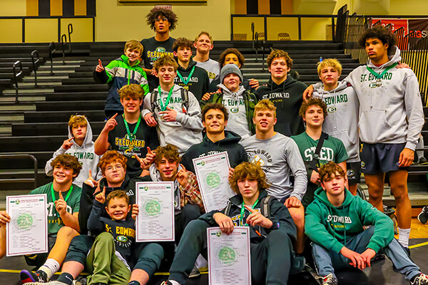 members of the st. edward high school wrestling program after a tournament