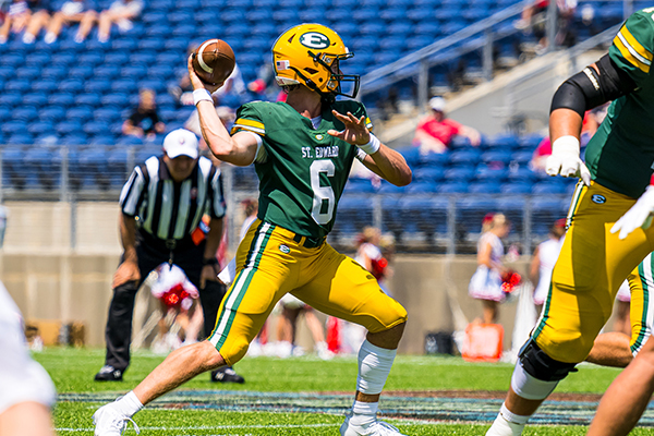 st edward varsity football quarterback throwing a pass