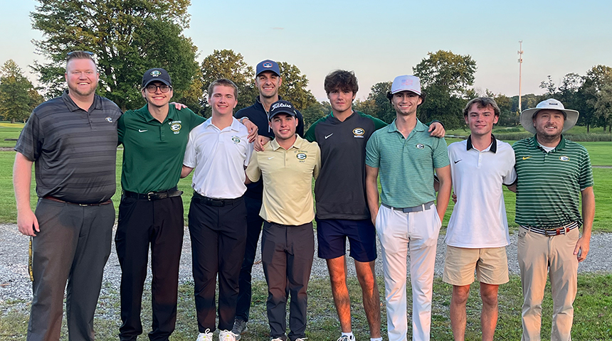 st. edward high school varsity golfers with coaching staff