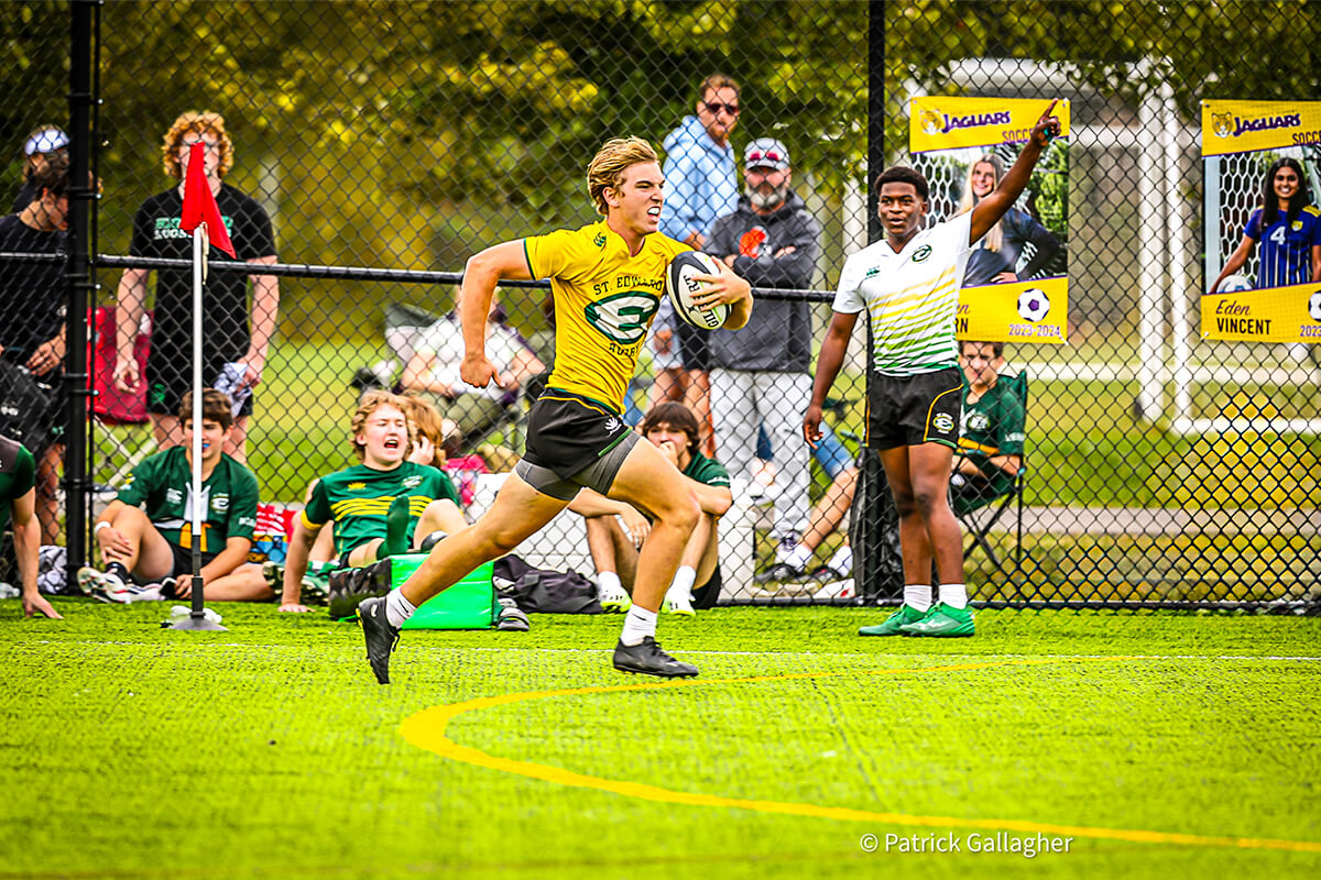 st. edward high school players in a rugby sevens match