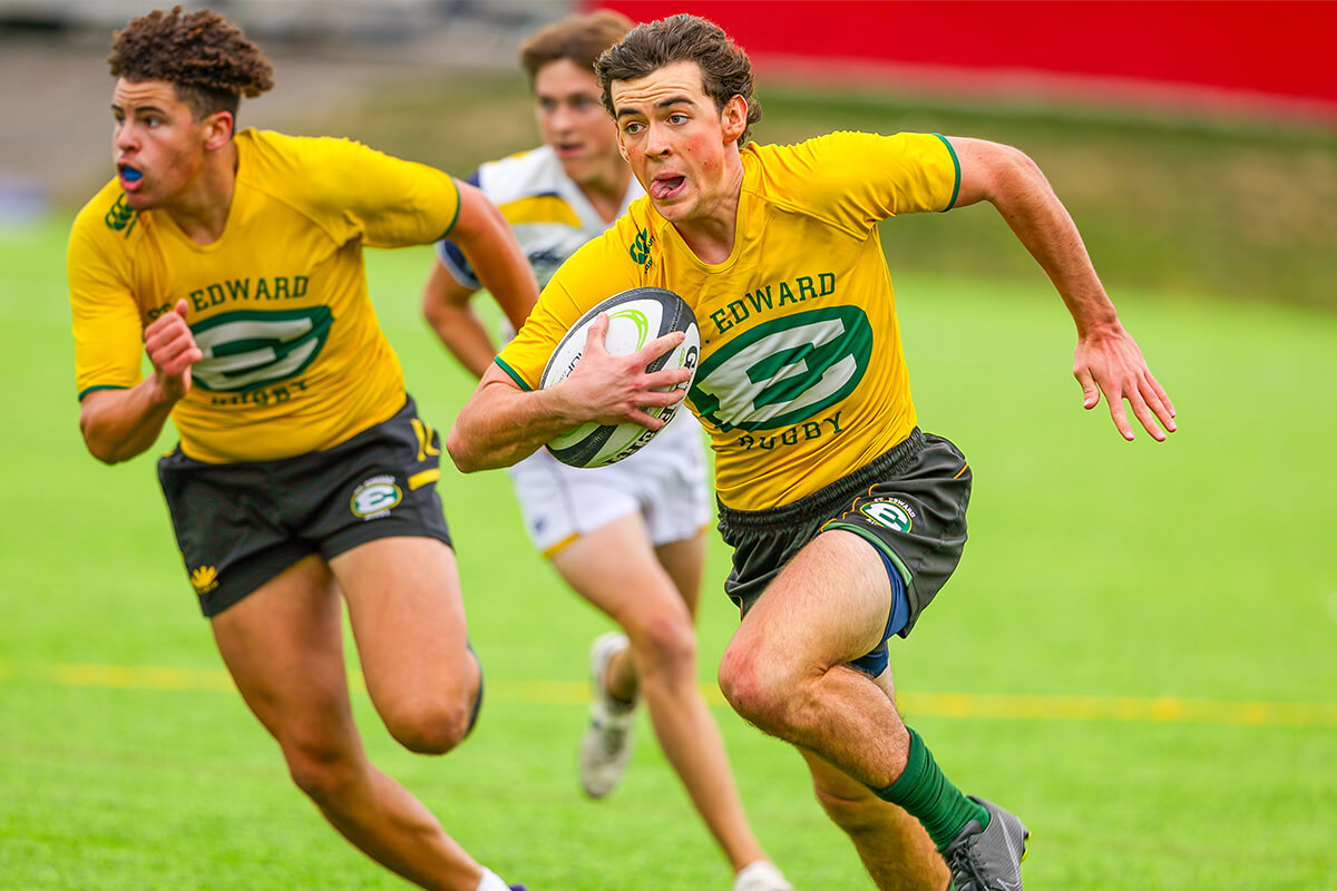 st. edward high school players in a rugby sevens match