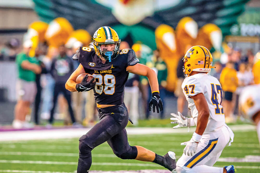 brandon white escapes a tackle against saint ignatius high school