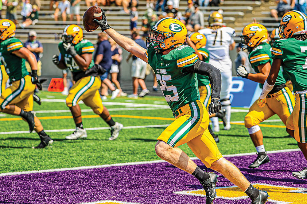 eddie andrews celebrates after scoring a touchdown