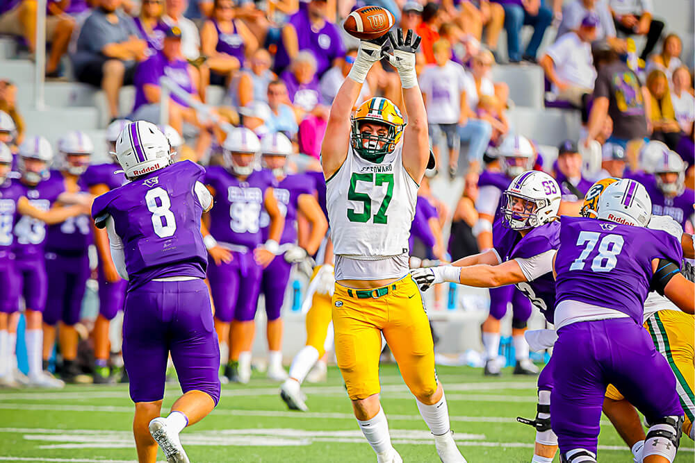 troy regovich blocks a pass in the team's game against cincinnati elder