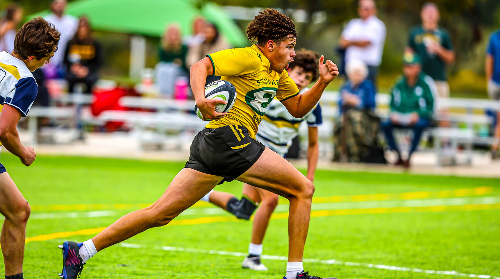 st. edward rugby sevens player running during a match