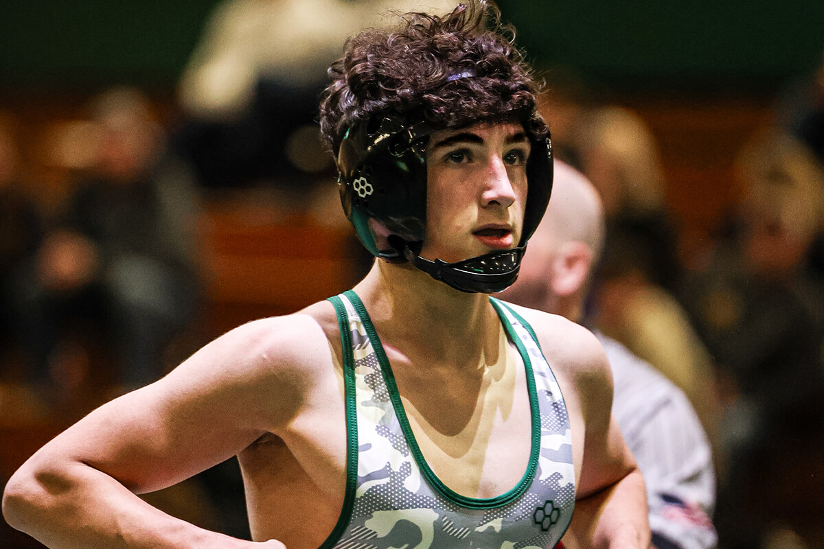 st. edward wrestler after winning a match against saint ignatius