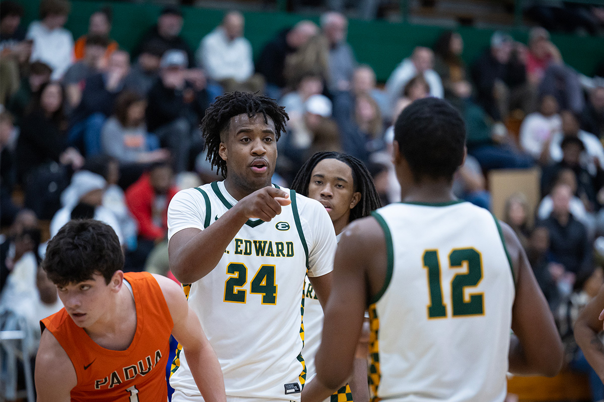 varsity basketball players during a game against padua