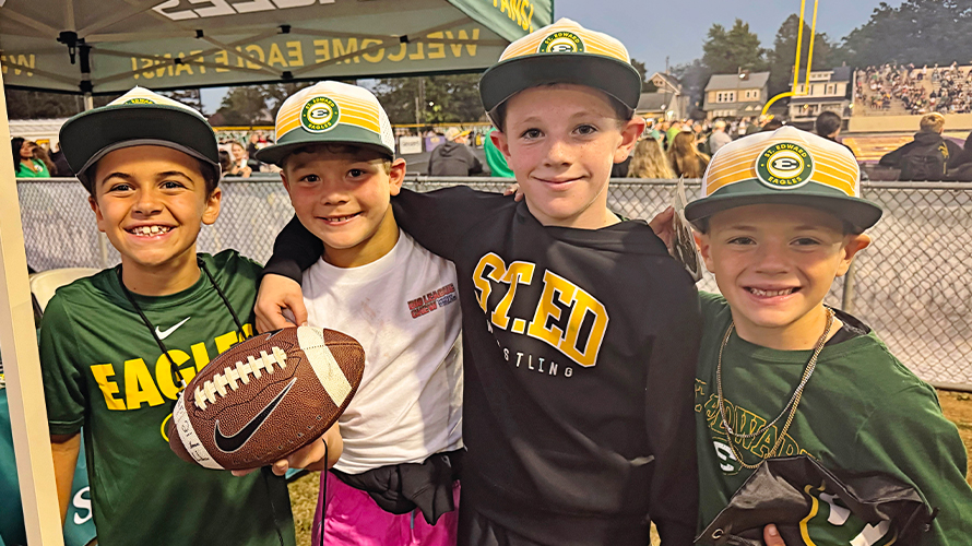 four Future Eagles at a St. Edward football game