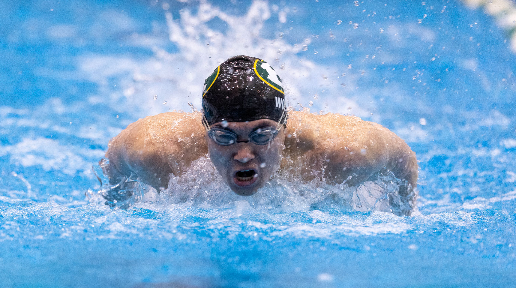 a st. edward swimmer during a meet